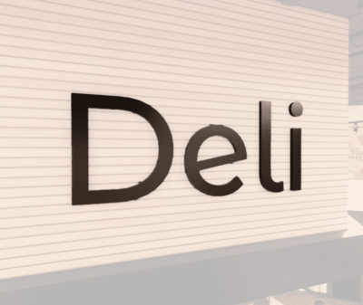 Modern collection's Deli department wayfinding sign that is wall mounted dimensional wood letters with metal laminate faces.