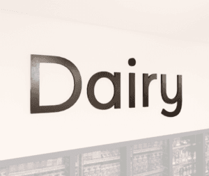 Modern collection wall copy dimensional letters for Dairy department wayfinding. Aluminum face with a finished edge