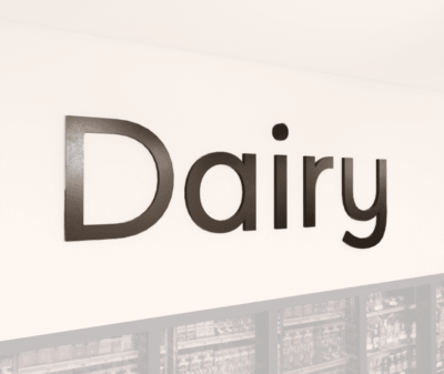 Modern collection wall copy dimensional letters for Dairy department wayfinding. Aluminum face with a finished edge