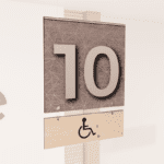 Modern Collection's double sided checkstand ADA Lane sign with digital printed vinyl-wrapped wood background and edges.