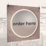 Modern Collection's single sided large dept. sign with digitally printed text "order here" centered on a circular overlay.