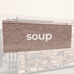 Modern Collection's singled sided small hanging dept sign with digitally printed white dimensional centered text "soup."