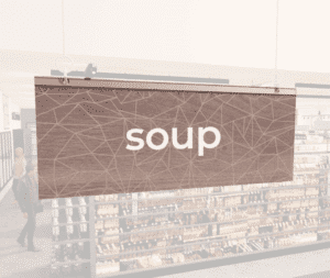 Modern Collection's singled sided small hanging dept sign with digitally printed white dimensional centered text "soup."
