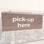 Modern Collection's singled sided small hanging department sign with digitally printed white dimensional text "pick-up here."