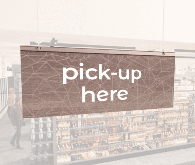 Modern Collection's singled sided small hanging department sign with digitally printed white dimensional text "pick-up here."