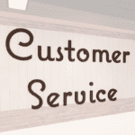 Natural collection wall copy dimensional letters for Customer Service department wayfinding. Brown painted finish.