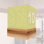 Natural Collection's checkstand cube with customizable text. The cube is made with white arylic & the base is media wrapped.