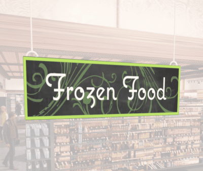 Natural Collection's wayfinding hanging dept sign for "Frozen Foods," in white text on 6 millimeter PVC and a green frame.