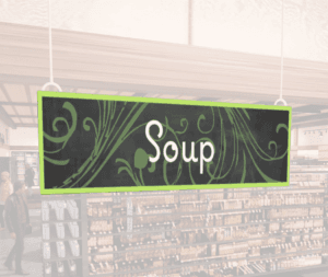 Natural Collection's hanging department sign with text reading "Soup" for Soup, Deli, or Prepared Food Department Wayfinding.