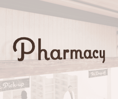 Natural Collection's Pharmacy dept. wayfinding sign large wall copy dimensional letters measuring about 29" tall by 127" wide.