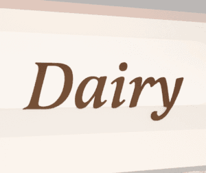 Traditional Collection's sign for the Dairy department that is wall mounted with dimensional wood letters & a painted finish