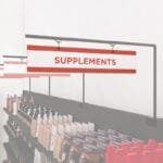 Health and beauty aisle outrigger pendants from the Iconic Collection's Cheerful color option.