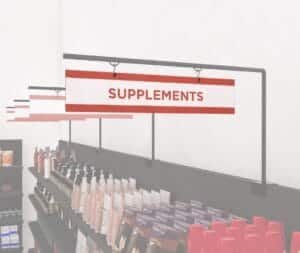 Health and beauty aisle outrigger pendants from the Iconic Collection's Cheerful color option.