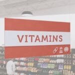 Tall department sign for the vitamins section from the Iconic Collection's cheerful color option.