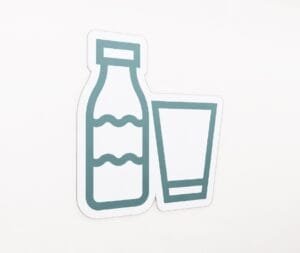 Dairy Department Graphic Panel Department sign is a bottle and glass of milk icon.