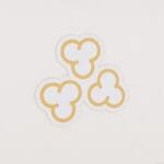 Bulk department graphic panel department sign shows three kernels of popcorn.