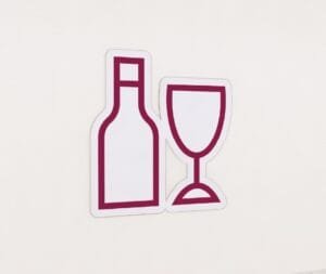 Wine glass and bottle icon from the Iconic Collection's cheerful color option.